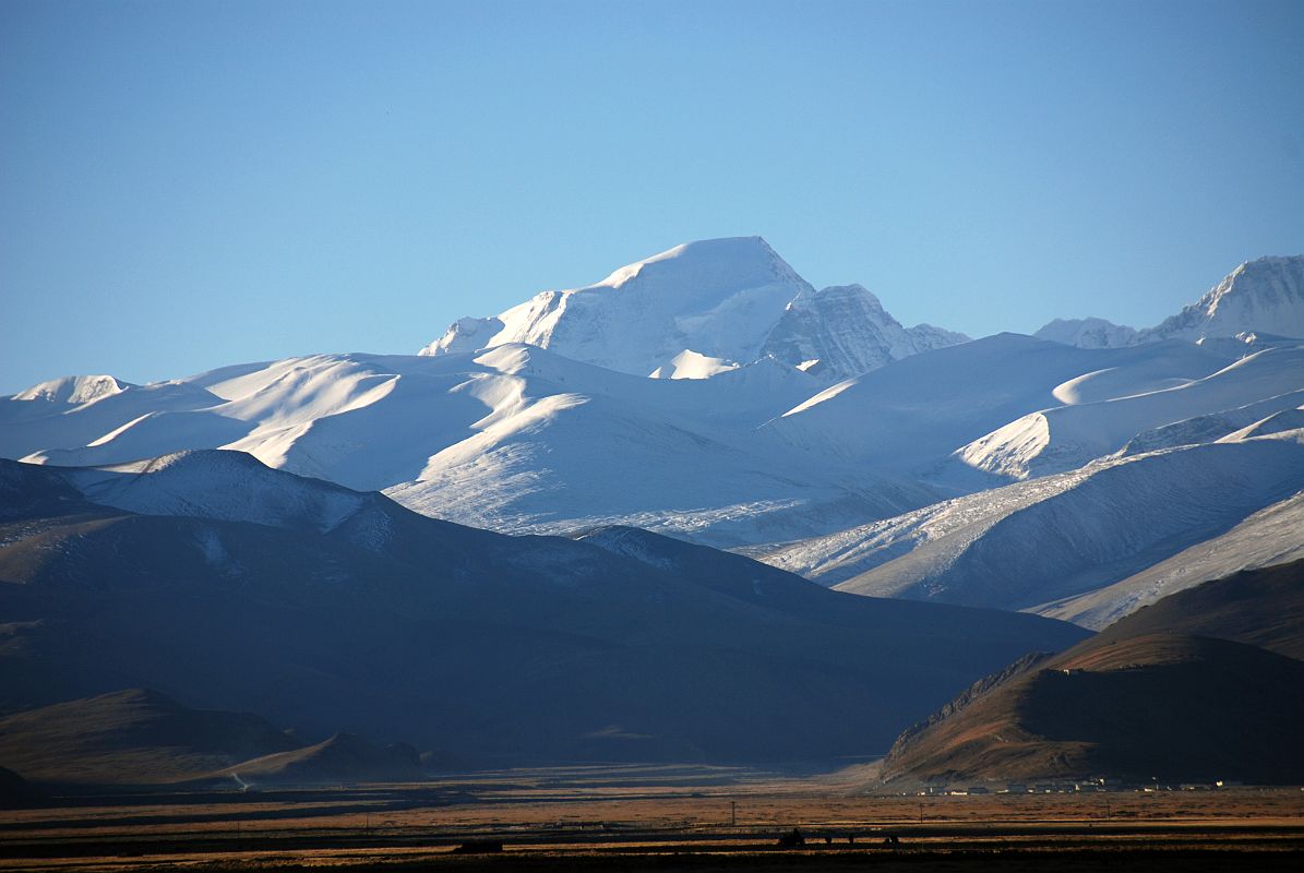 08 Gyachung Kang Early Morning From Across Tingri Plain The first ascent of the North Face of Gyachung Kang (7952m), seen from Tingri in the early morning, was done in pure alpine style with Slovenians Tomaz Jakofcic and Peter Meznar reaching the summit on October 31, 1999, and Andrej Stremfelj, Marko Car, Marko Prezelj, Matic Jost the next day.